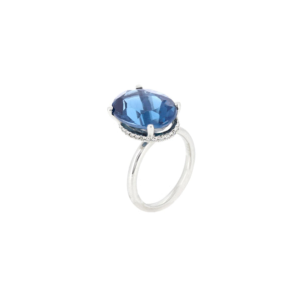 14 Karat White Gold Ring with Oval blue Topaz and diamonds