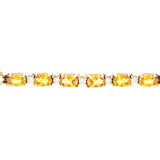 14 karat Yellow Gold Tennis Bracelet With Yellow Sapphires and Diamonds