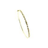 14 Karat Yellow Gold Hinged Oval Bangle with Round and Baguette Diamonds