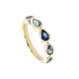 18 Karat Yellow Gold Bezel Band With Blue Sapphires