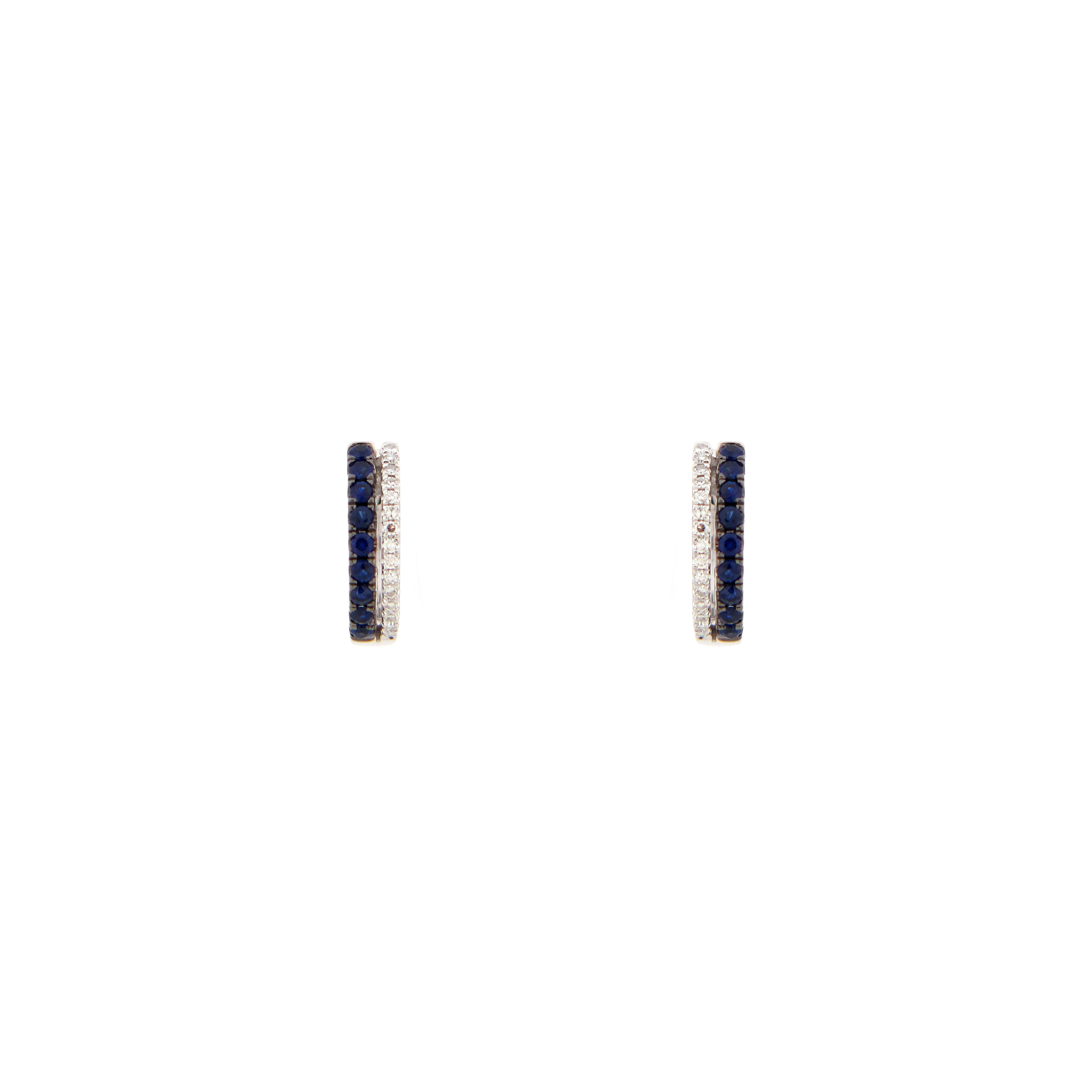 14 karat white gold huggies with Blue sapphires and diamonds