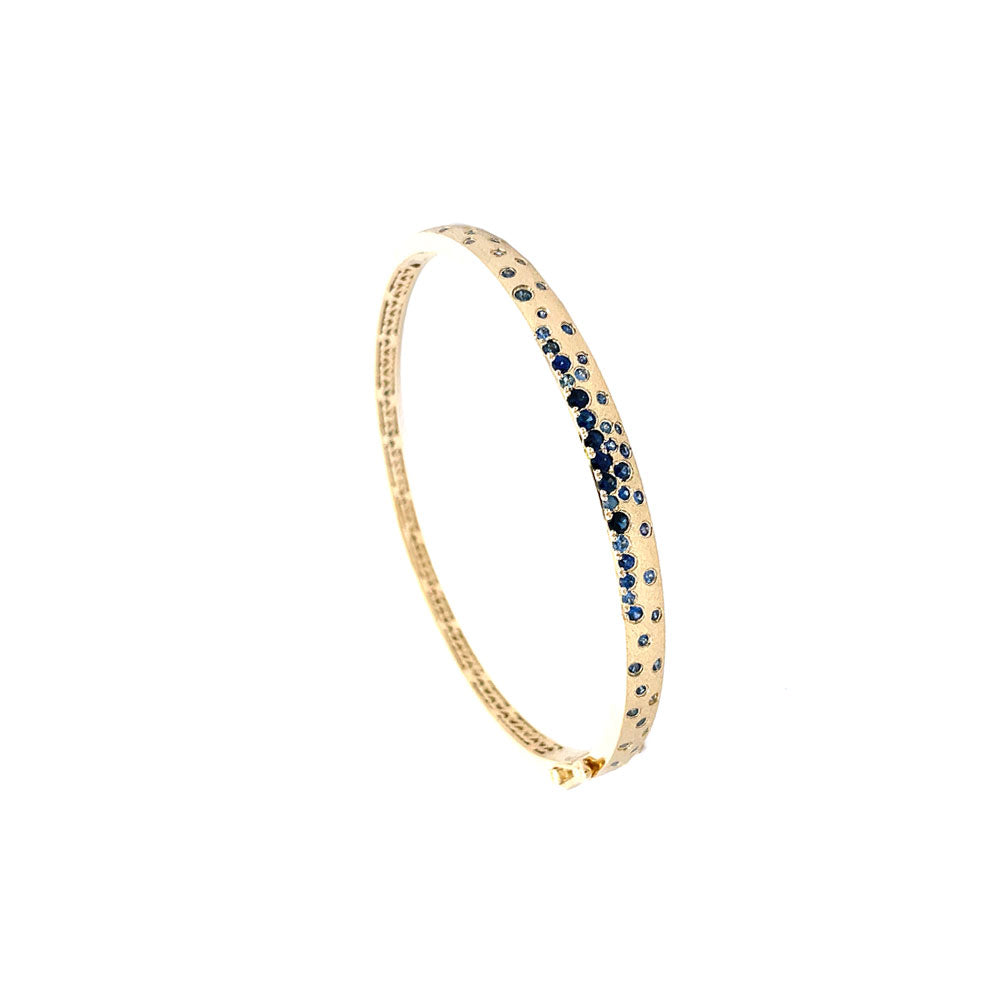 18 Karat Yellow Gold Narrow Confetti Band With Blue Sapphires