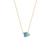 14 Karat Yellow Gold Toi Et Moi Necklace With A Emerald Cut Blue Topaz And Diamonds