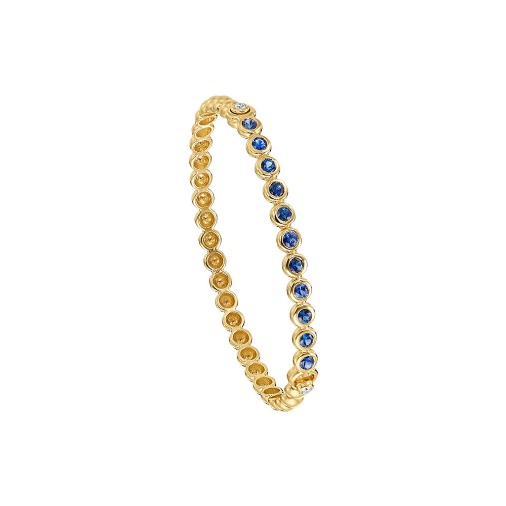 18 Karat White Gold Nutmeg Bangle with Blue Sapphires and Diamonds