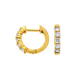 14 Karat Yellow Gold Huggie Earrings With Round Diamonds