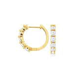 14 Karat Yellow Gold Huggie Earrings With Diamonds