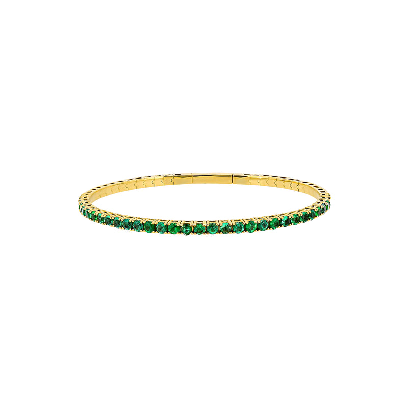 14 Karat Yellow Gold Flexible Bangle With Emeralds