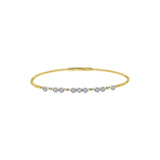 14 Karat Yellow and White Gold Flexible Bangle with Bezel set Diamonds