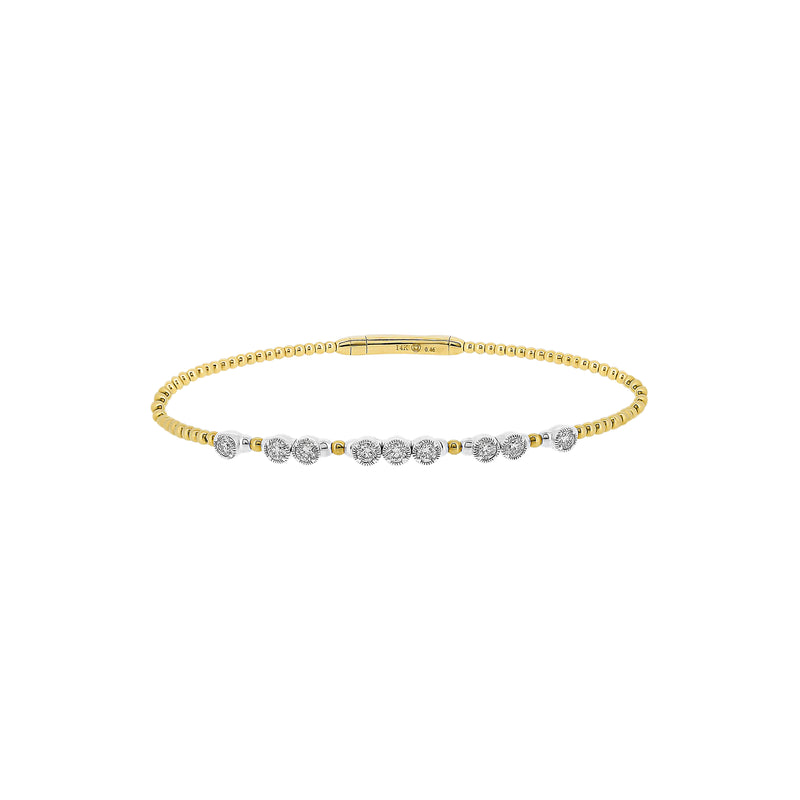 14 Karat Yellow and White Gold Flexible Bangle with Bezel set Diamonds