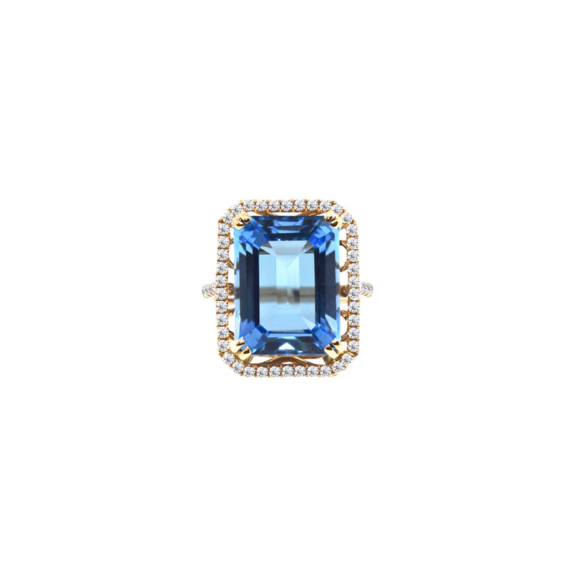 14 Karat Rose Gold Ring with Emerald Cut Blue Topaz