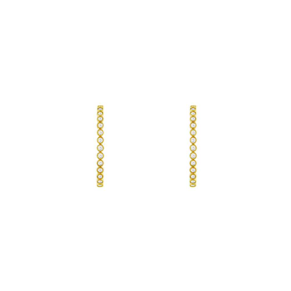 14 Karat Yellow Gold Oval Hoop Earrings With Diamonds