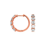 14 Karat Rose Gold Huggie Earrings With Diamonds