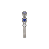 14 karat yellow gold band with sapphires and diamonds