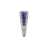 14 karat white gold ring with diamonds and sapphires