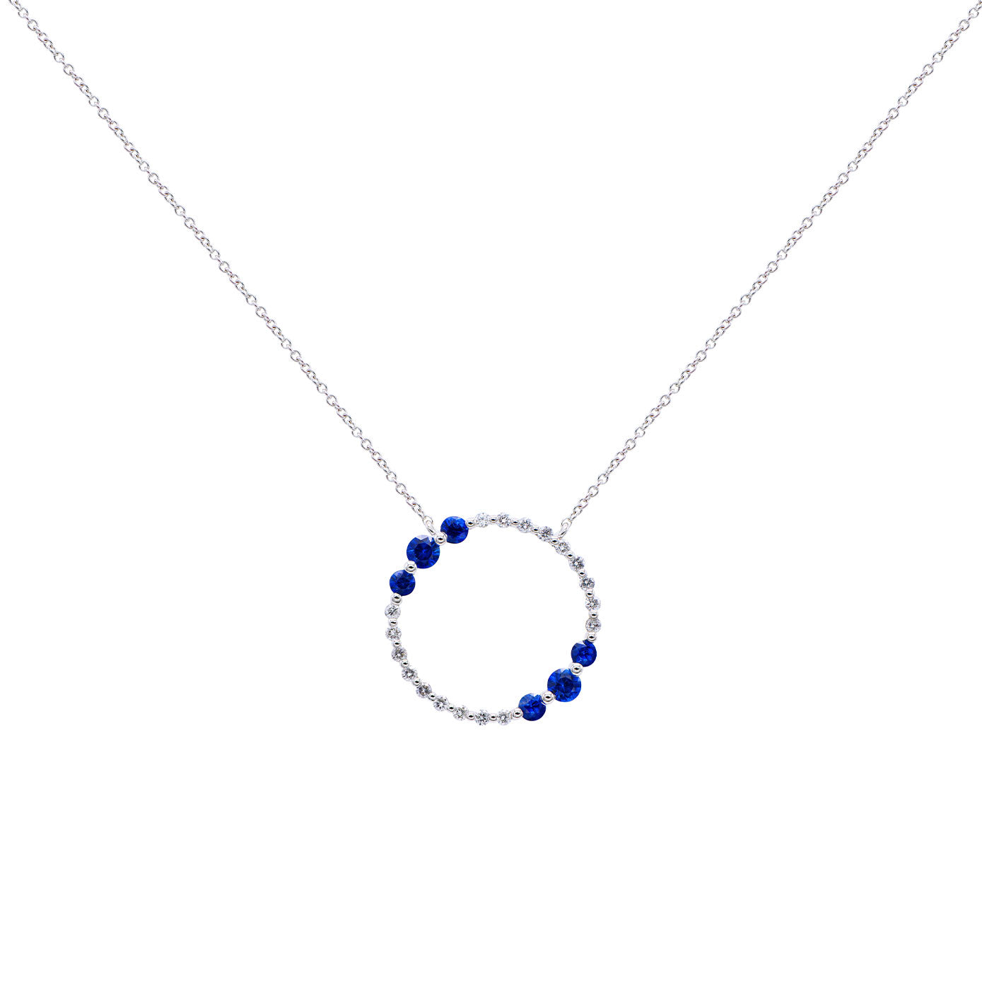 14 Karat White Gold Halo Necklace With Blue Sapphires And Diamonds