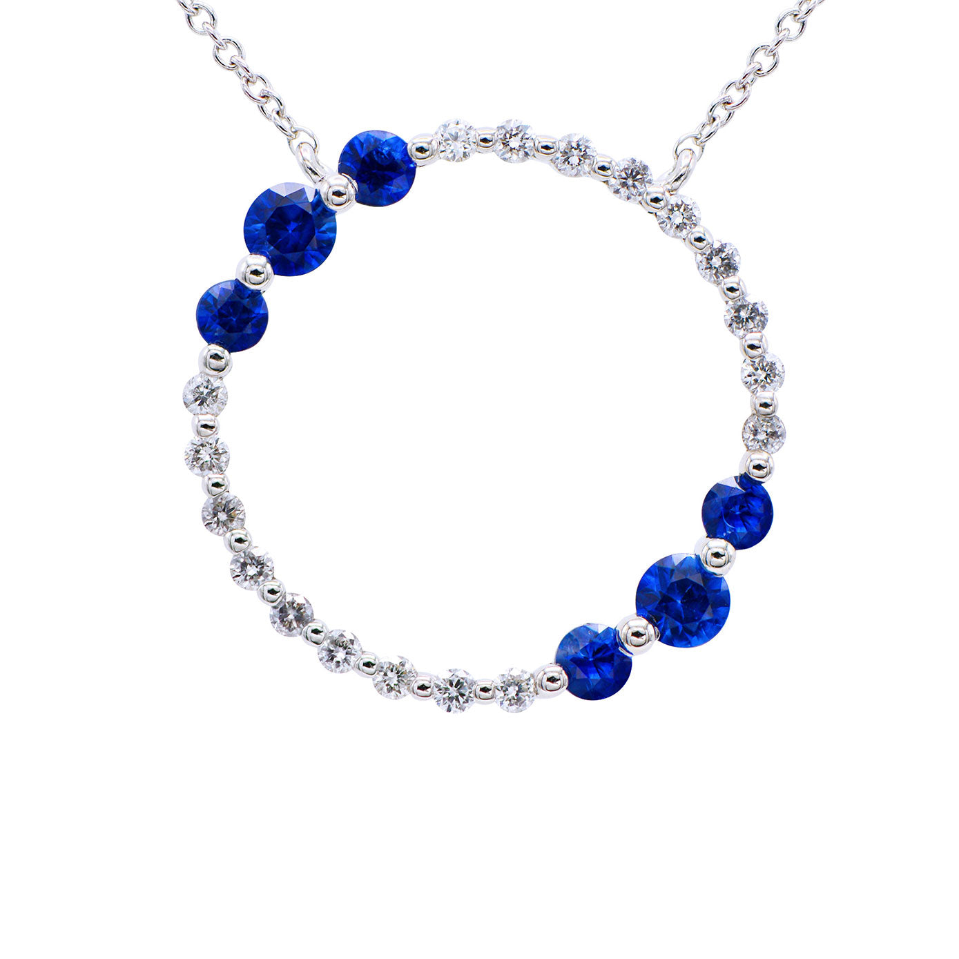 14 Karat White Gold Halo Necklace With Blue Sapphires And Diamonds