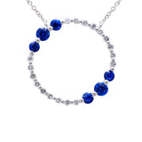14 Karat White Gold Halo Necklace With Blue Sapphires And Diamonds