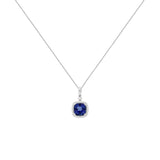 14 Karat White Gold Halo Necklace With A Tanzanite & Diamonds