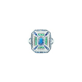 18 Karat White Gold Ring With Center Blue Oval Sapphire, Emeralds