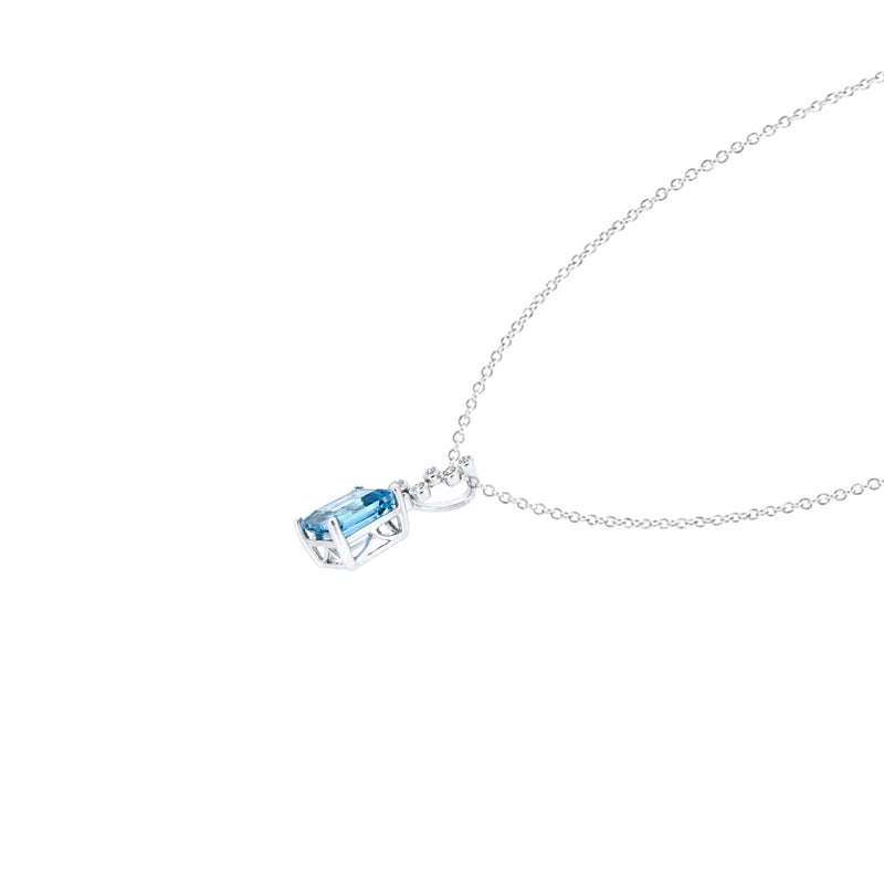 14 karat White Gold Pendant with Baguette Blue Topaz and Diamonds