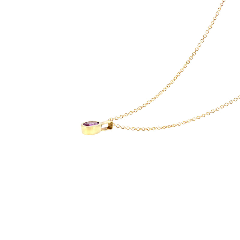 14 Karat Yellow Gold Bezel Set Pendant with Pink Sapphire