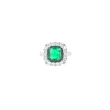 Platinum Ring With Cushion Cut Emerald and Diamond Halo