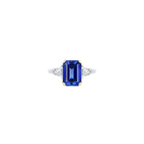 Platinum and 18 Karat Yellow Gold Three Stone Ring with a Certified Blue Sapphire and Diamonds