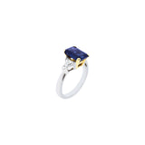 Platinum and 18 Karat Yellow Gold Three Stone Ring with a Certified Blue Sapphire and Diamonds