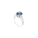 Platinum Solitaire Ring With Oval Blue Sapphire and Diamonds