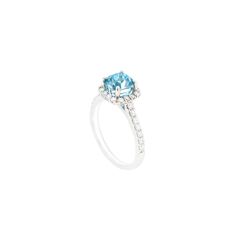 18 Karat White Gold Ring with Blue Zircon and Diamond Halo