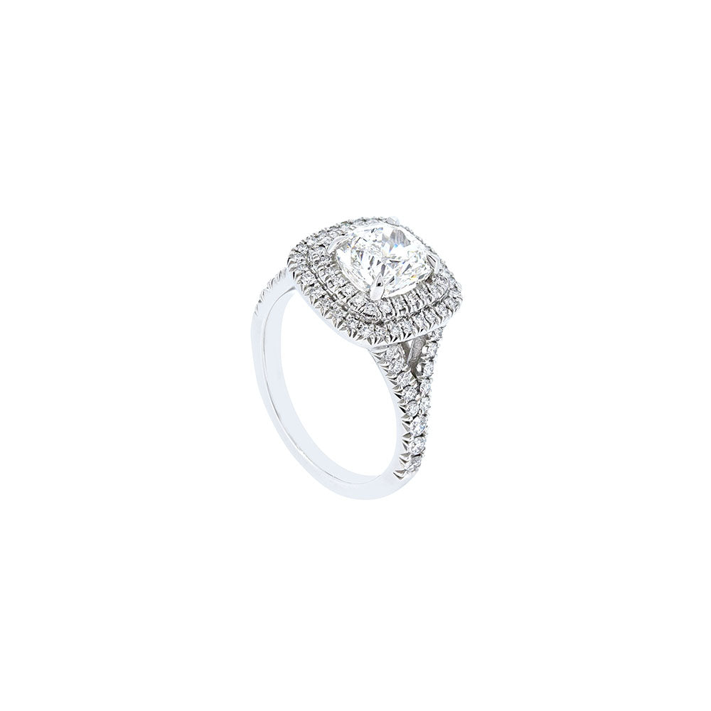 Sparkling diamond ring with a cushion cut center stone